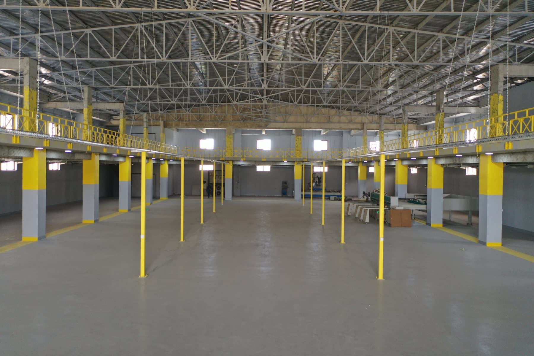 Warehouse interior with coated columns and floor
